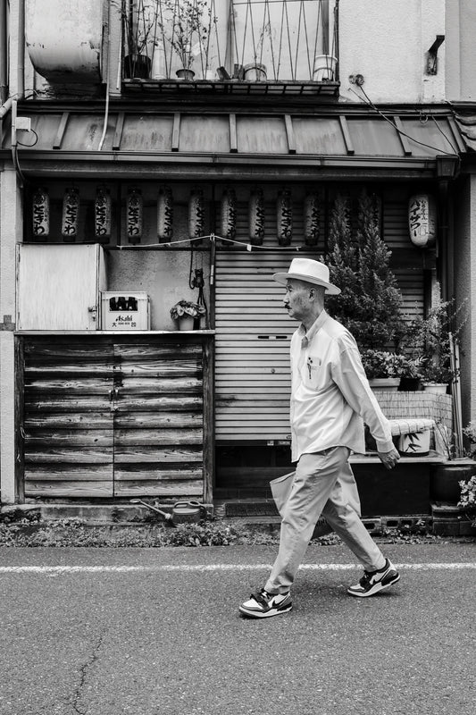 Man walking in Yanaka and Nezu photography workshop