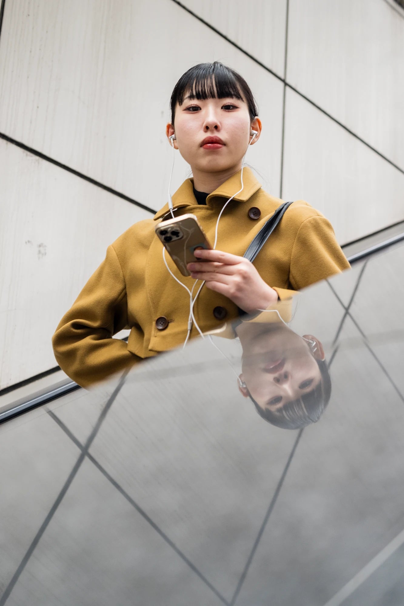 Environmental portraiture Tokyo-Girl reflected in Tokyo Glass