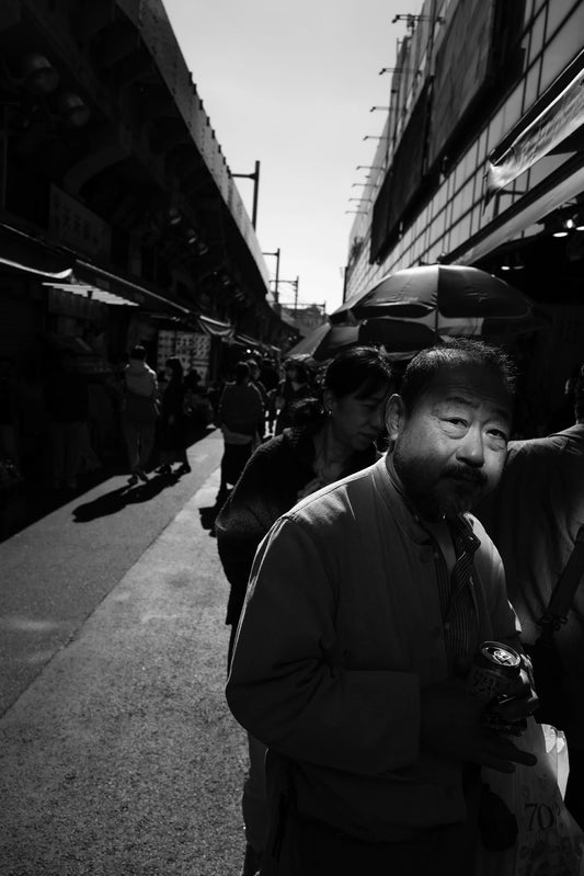 Ameyoko market street photography-man in vein of light
