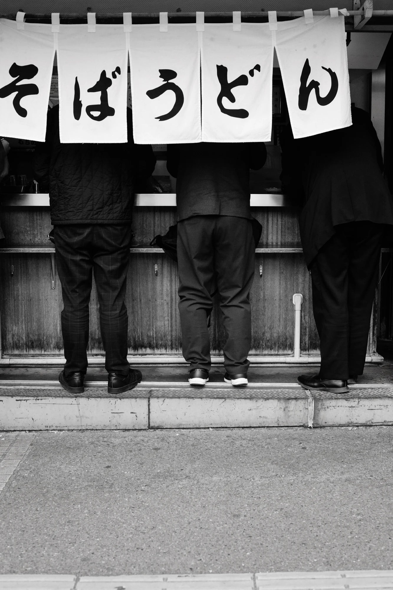 Three men at soba shop-Documentary photography mentorship