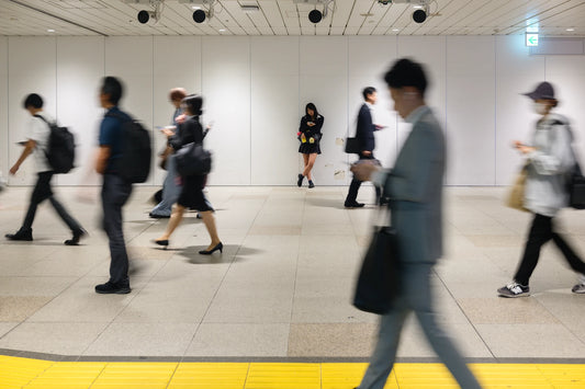 Slow-shutter street photography techniques of a girl in the Shinjuku underground