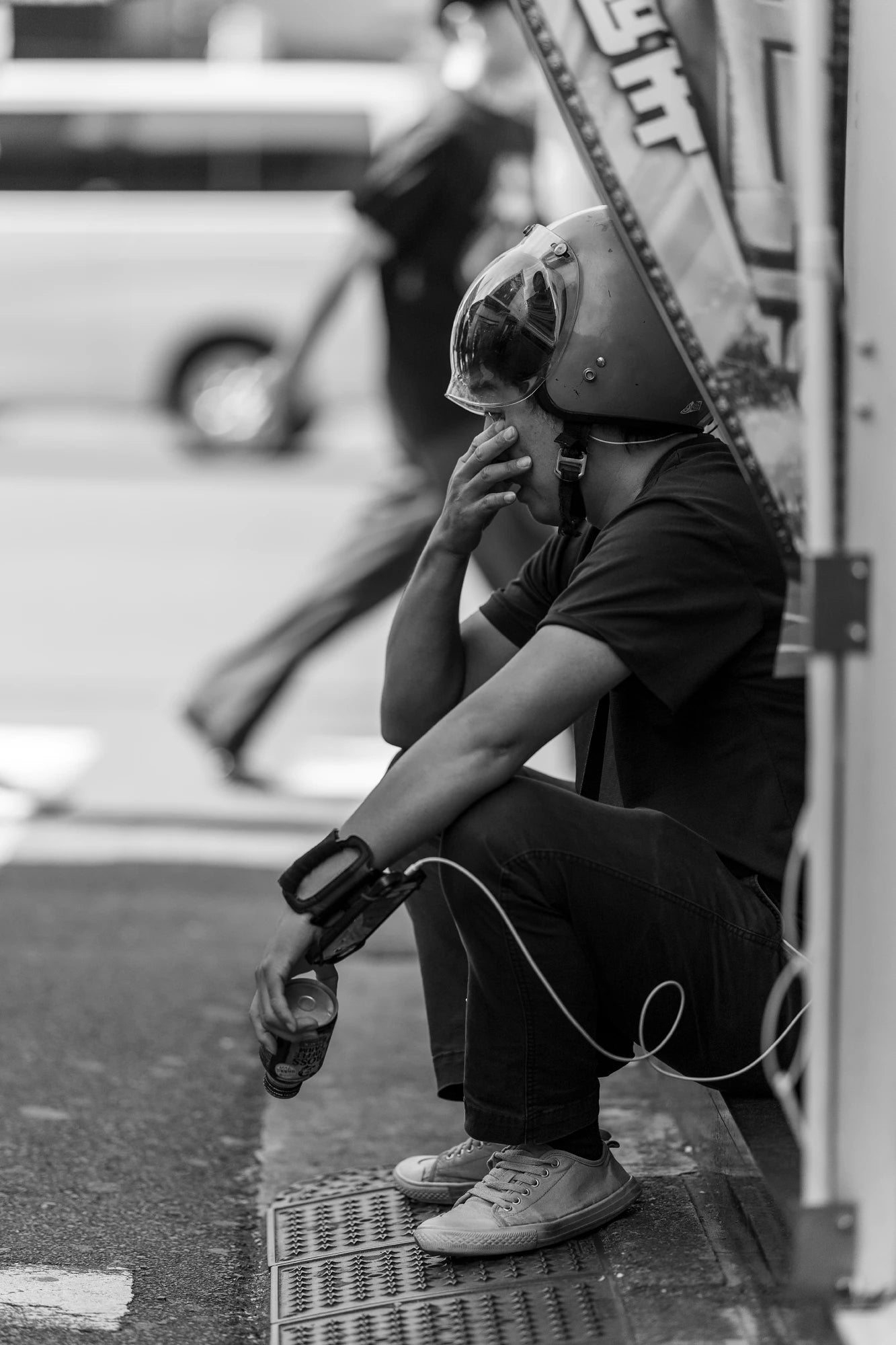 Deliver driver sits on ground-Ameyoko market street photography